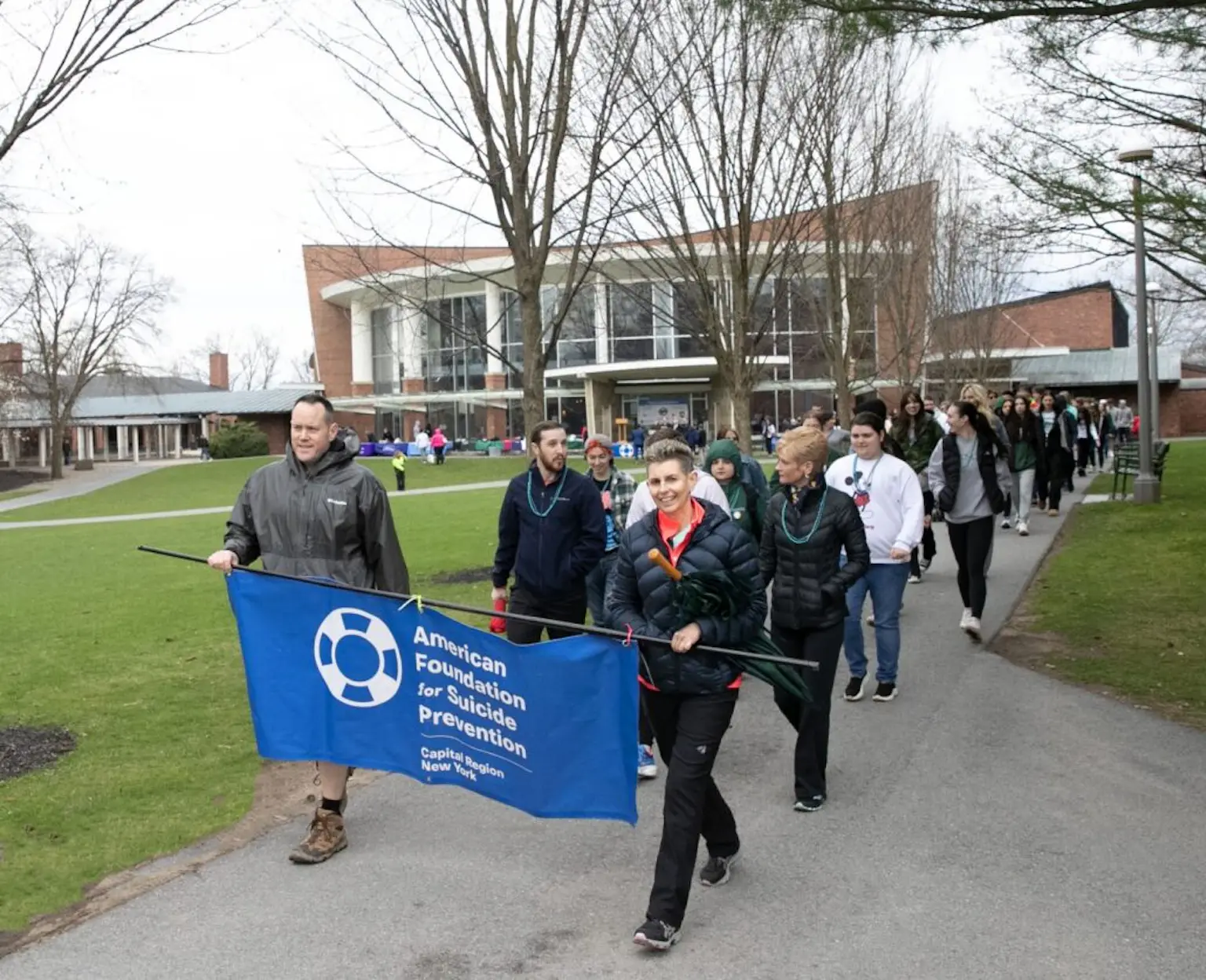 Volunteers walking on Skidmore College campus