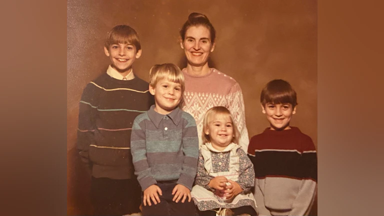 A picture of the author as a child, with his mother and siblings.