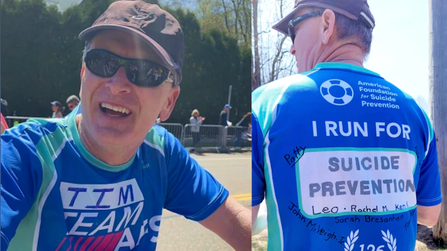 Timothy Iriving smiling and wearing a blue t-shirt that says, "I RUN FOR SUICIDE PREVENTION."