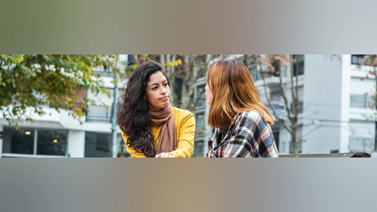 Two women sitting in conversation