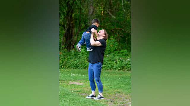woman holding child