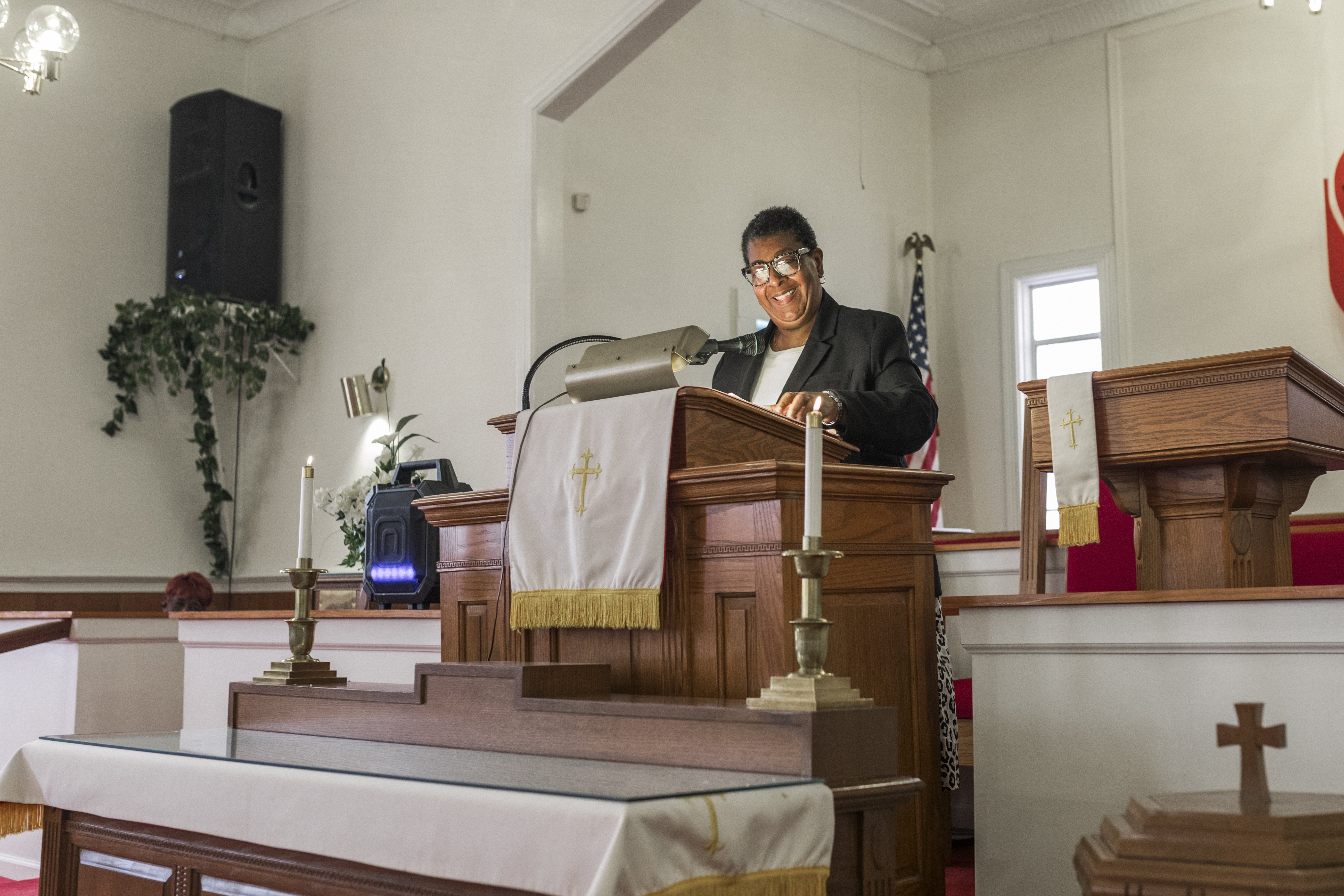 Pastor Giving Sermon at Church Pulpit