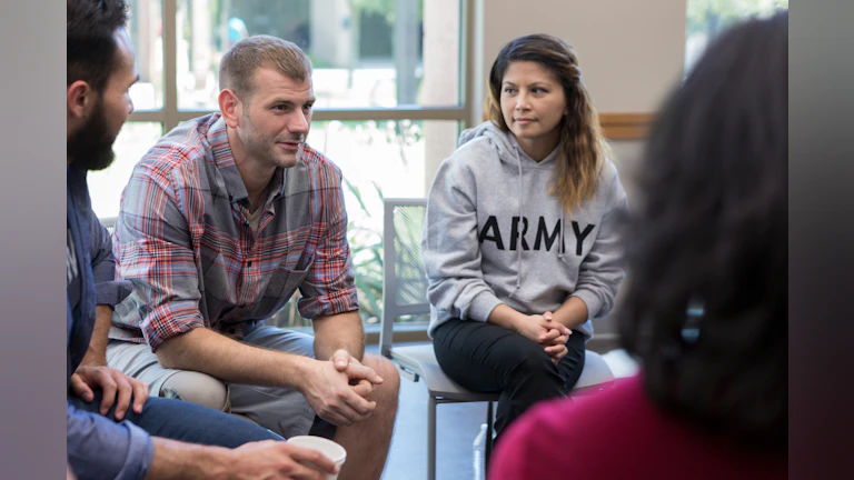 Men and women talking in a group
