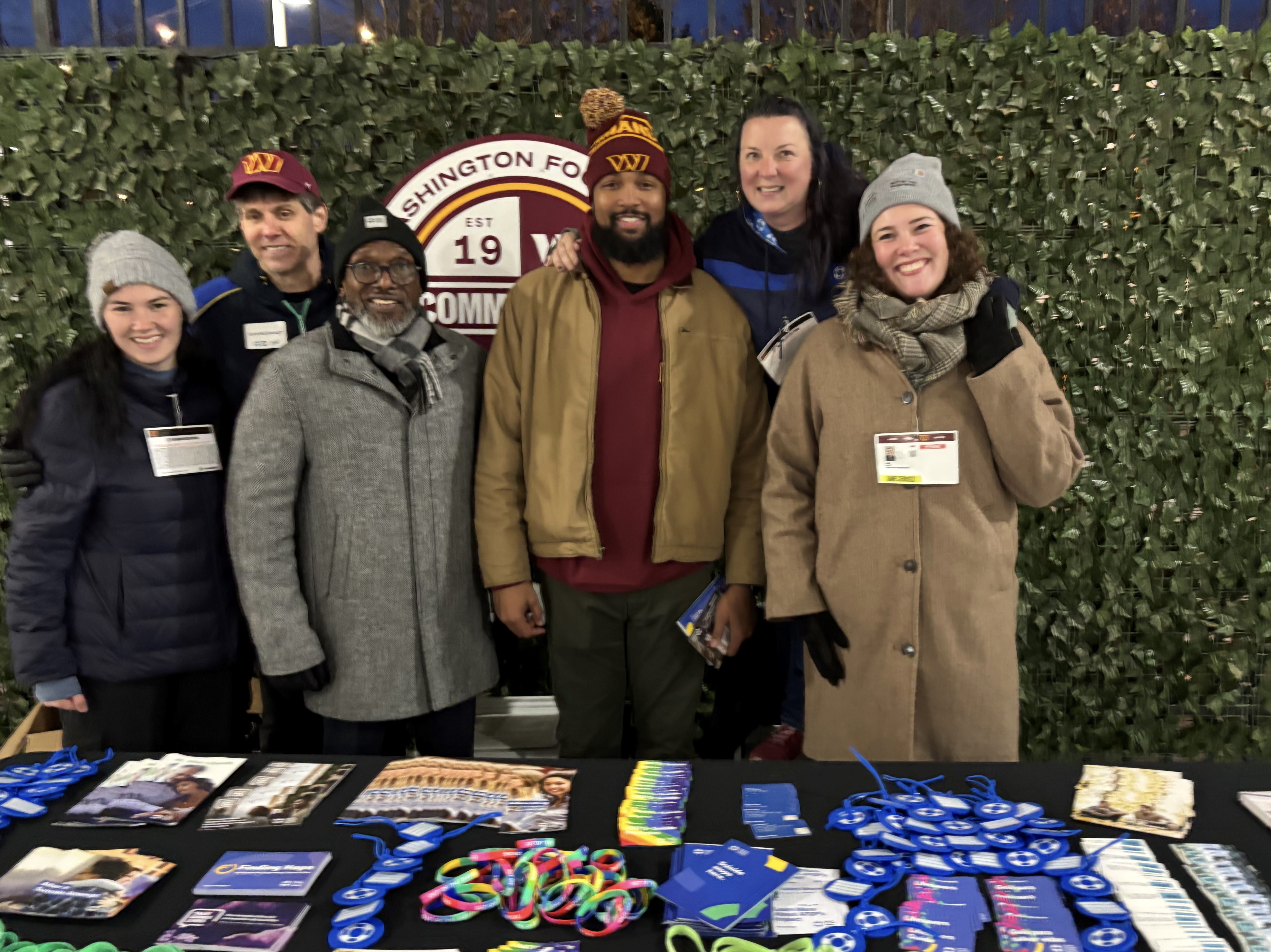 AFSP National Capital Area Chapter tabling at the mental health pre-game event.
