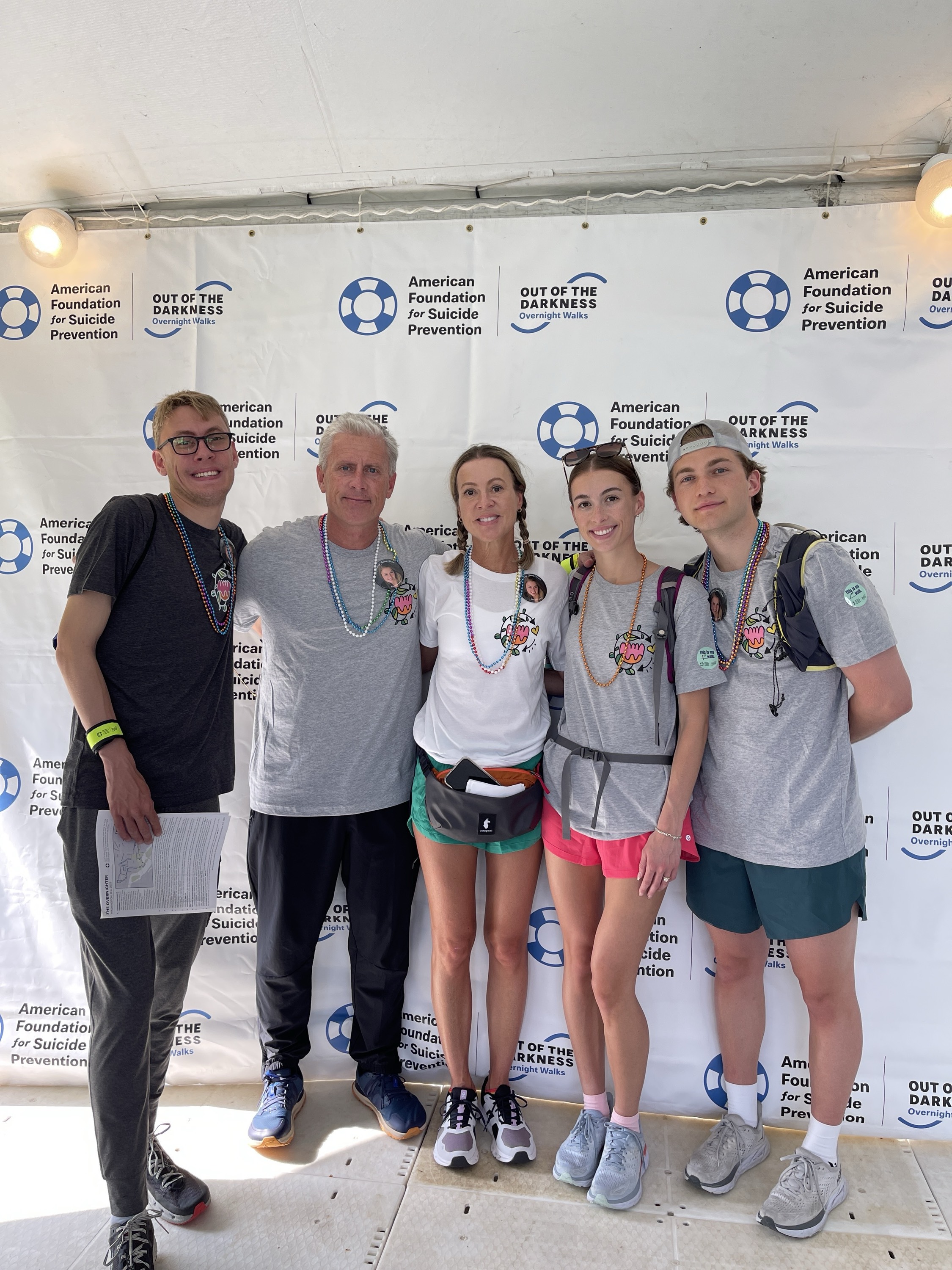 The Walton family participates in the 2023 AFSP Out of the Darkness Walk in Washington, DC, in honor of their daughter and sister, Jessica Walton, who passed away in 2020. From left to right: Joshua Walton, Jason Walton, Kristen Walton, Laura Walton, Grant Balls