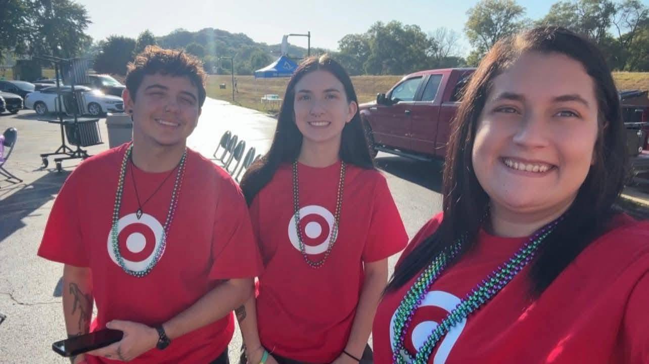 Three supporters at a walk event.