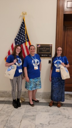 The author, Donna Birkholz (middle), with two fellow Volunteer Advocates at the 2025 Advocacy Forum.
