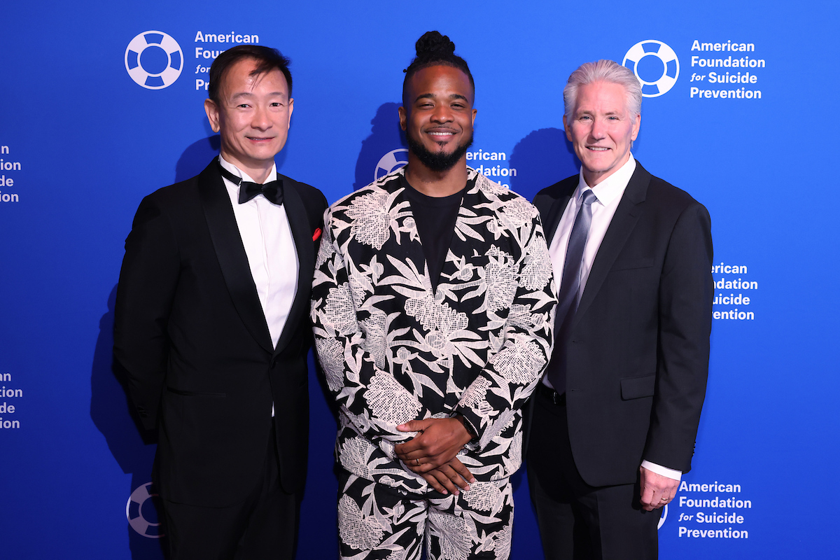 Left to right: Peter Fang, gala chair, Johnson & Johnson; Michell C. Clark, gala host; Wayne Drevets,  Johnson & Johnson