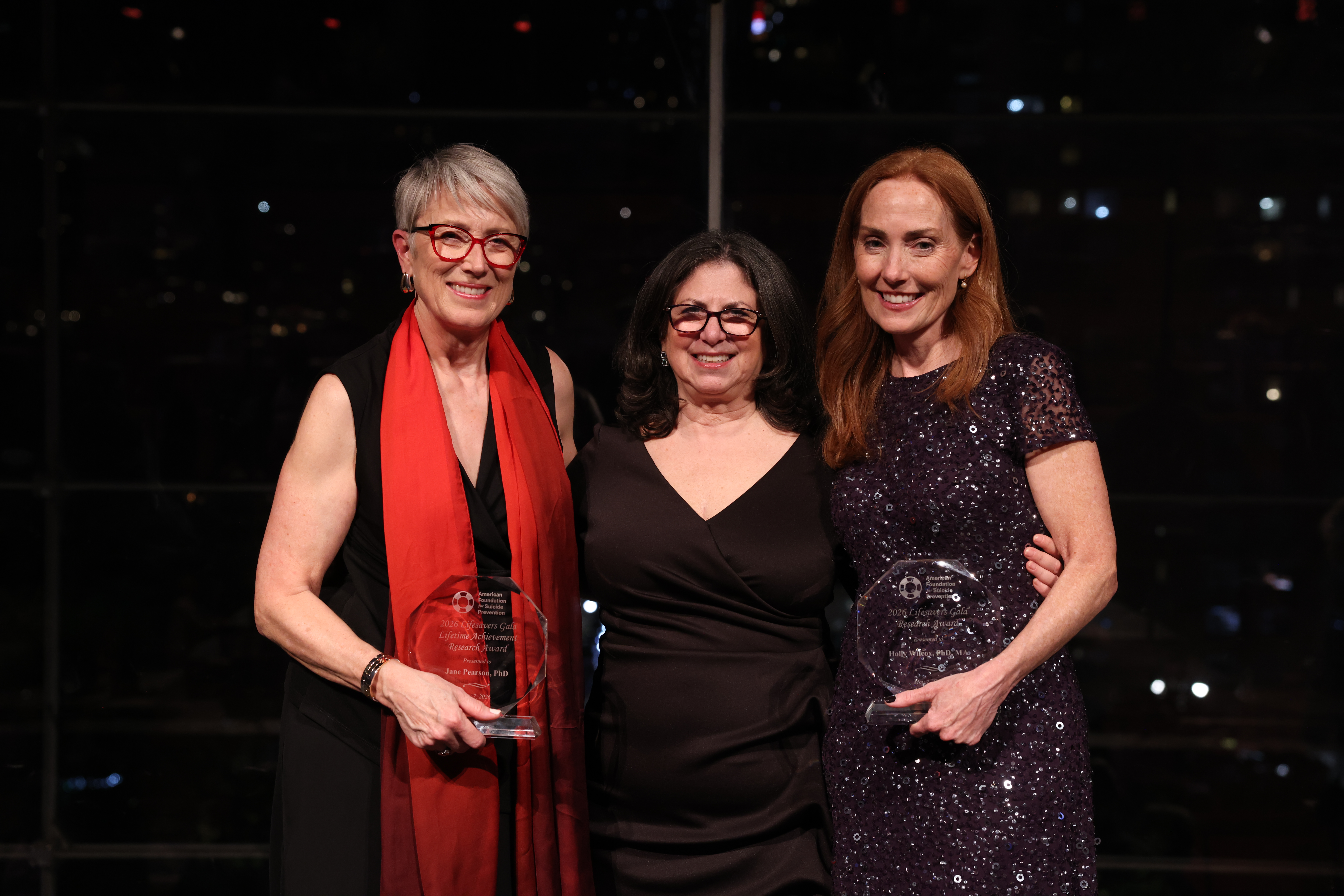 Research awardees standing with Dr. Jill