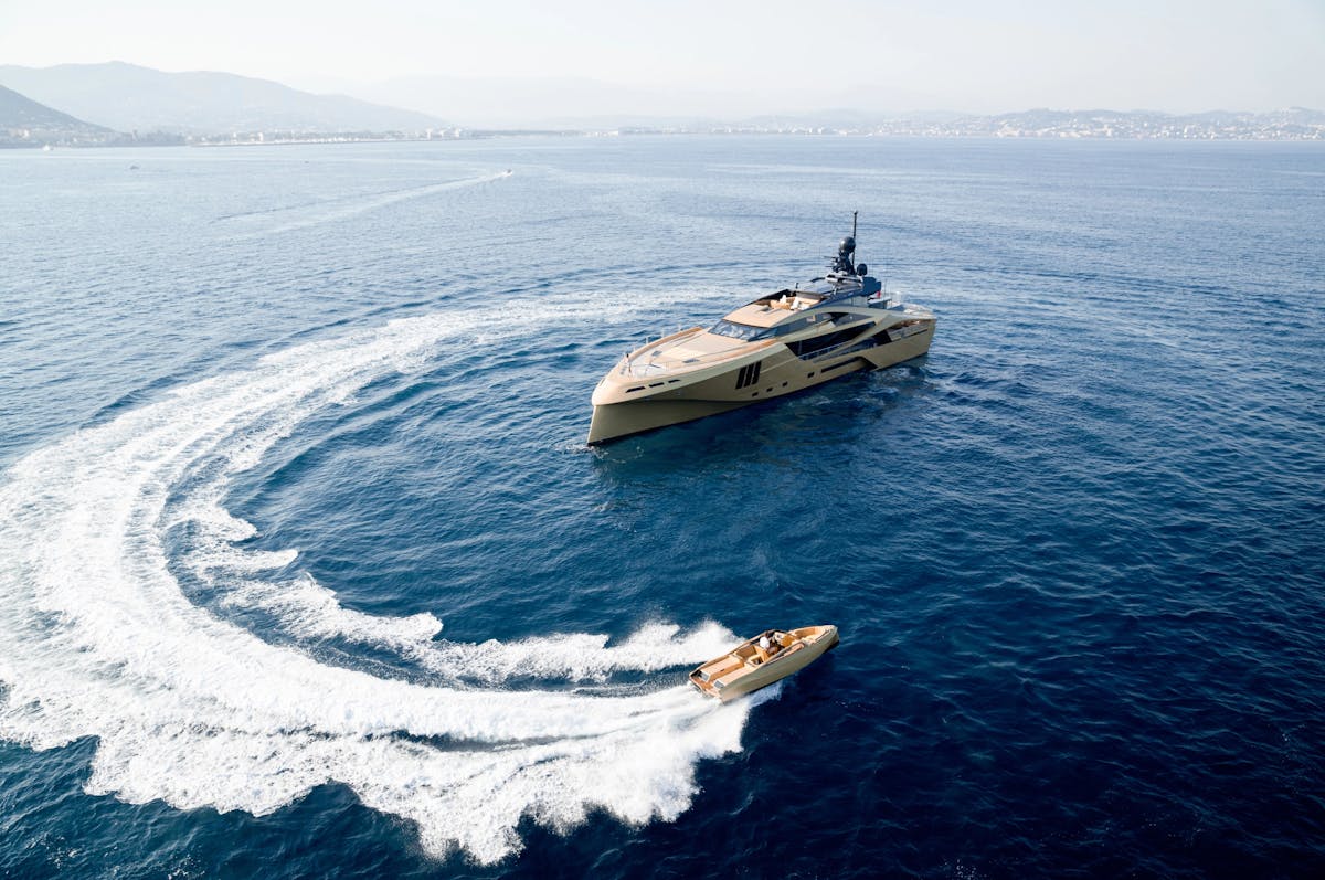 Speedboat circulating the yacht