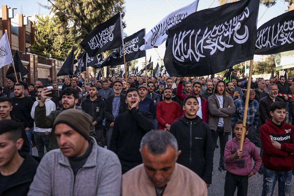 Palestinians marching against Israel in the city of Hebron in the West Bank on December 12, 2023. *HAZEM BADER/AFP via Getty Images.* Omari Podcast