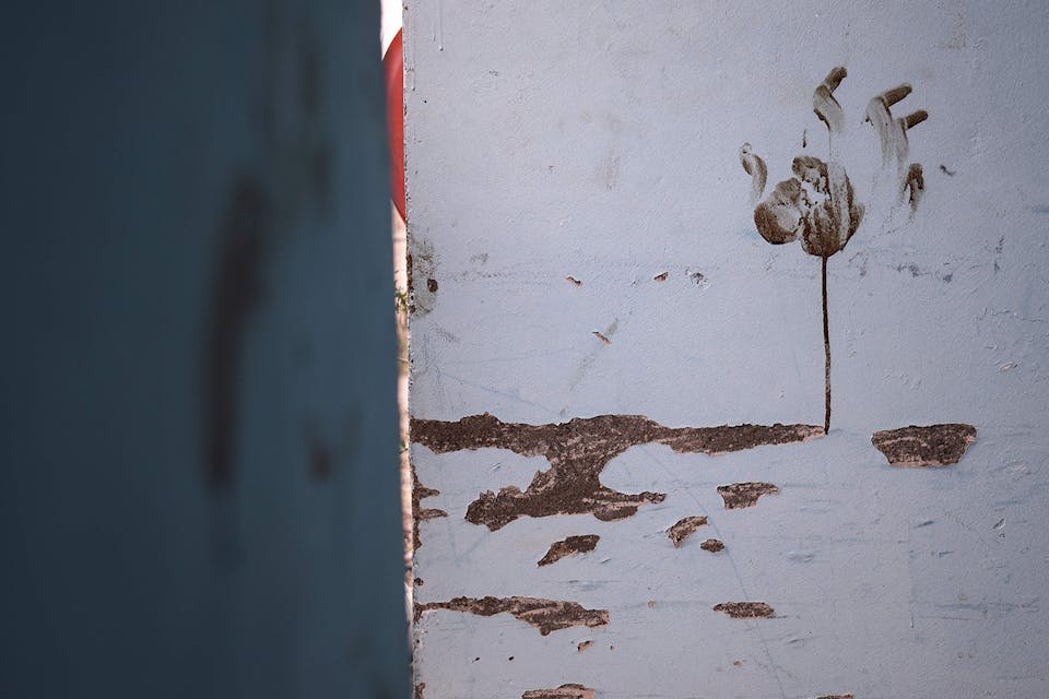 A bloody handprint inside a bedroom at the Thai workers' residence at Kibbutz Nir Oz in southern Israel, after the October 7 attack by Hamas. *KENZO TRIBOUILLARD/AFP via Getty Images*. Phil Amalek