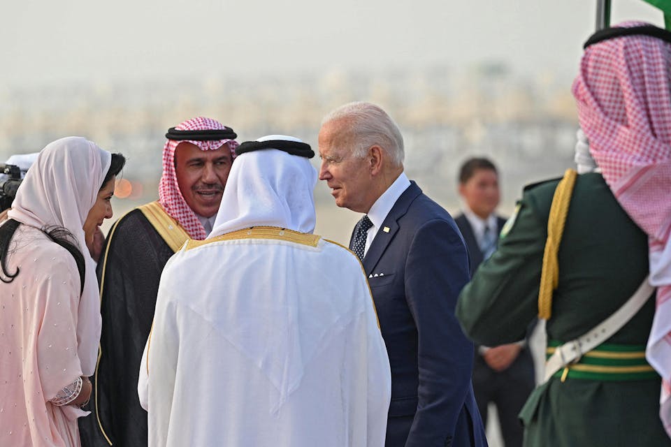 President Joe Biden is welcomed by Mecca province governor Prince Khaled al-Faisal (white robe) and Princess Reema bint Bandar Al-Saud (L), Saudi Arabia's ambassador to Washington, at the King Abdulaziz International Airport in the Saudi coastal city of Jeddah, upon his arrival from Israel, on July 15, 2022. *MANDEL NGAN/AFP via Getty Images*. Goldberg US Saudi