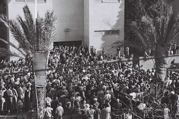 *Crowds await Israel’s Declaration of Independence, written with the help of an American Jew.* Independence Hall/Beit Haatzmaut Museum. Israeli Declaration