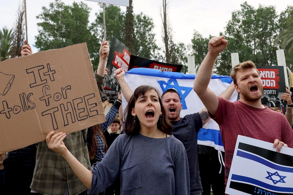 Israeli students in Tel Aviv demonstrate against Prime Minister Benjamin Netanyahu's new government on January 16, 2023. *JACK GUEZ/AFP via Getty Images.* Tolls