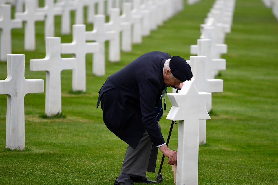 WWII veteran Mervyn Kresh places a poppy on an inscribed wooden star of David by a headstone after a remembrance ceremony at the Normandy American Cemetery in Colleville-sur-Mer on June 4, 2019, ahead of the 75th anniversary of D-Day. *DAMIEN MEYER/AFP via Getty Images*. Operation Benjamin Main