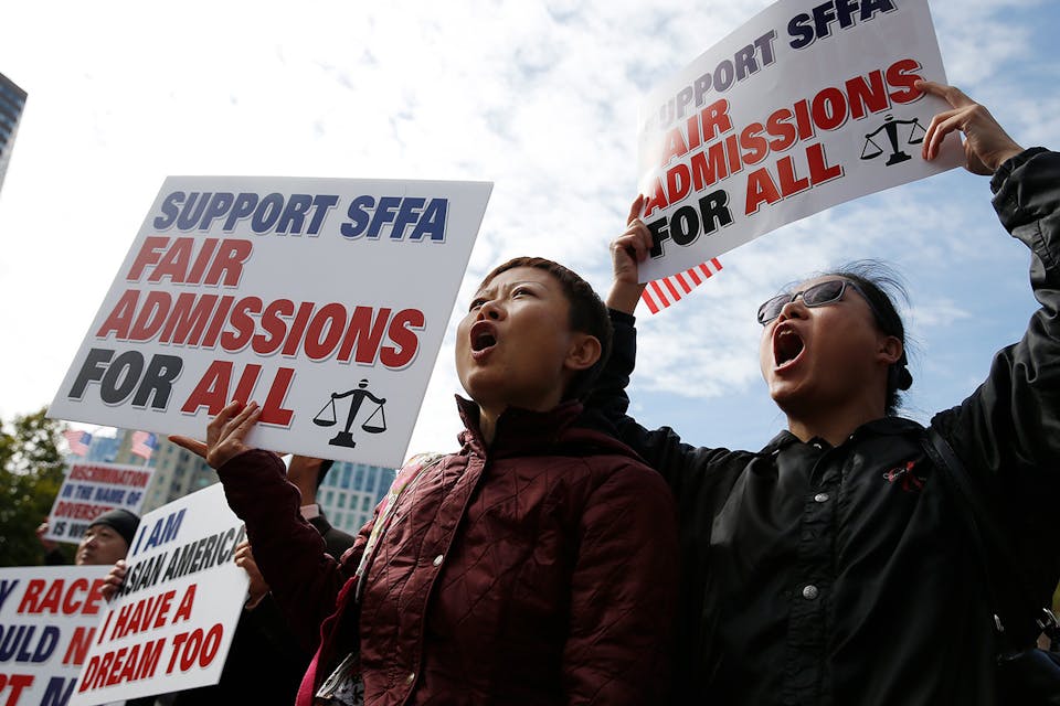 A rally in Boston's Copley Square in support of Students for Fair Admissions' lawsuit against Harvard University and to protest Harvard's alleged anti-Asian discrimination in admissions on Oct. 14, 2018. *Jessica Rinaldi/The Boston Globe via Getty Images*. Wisse AA main