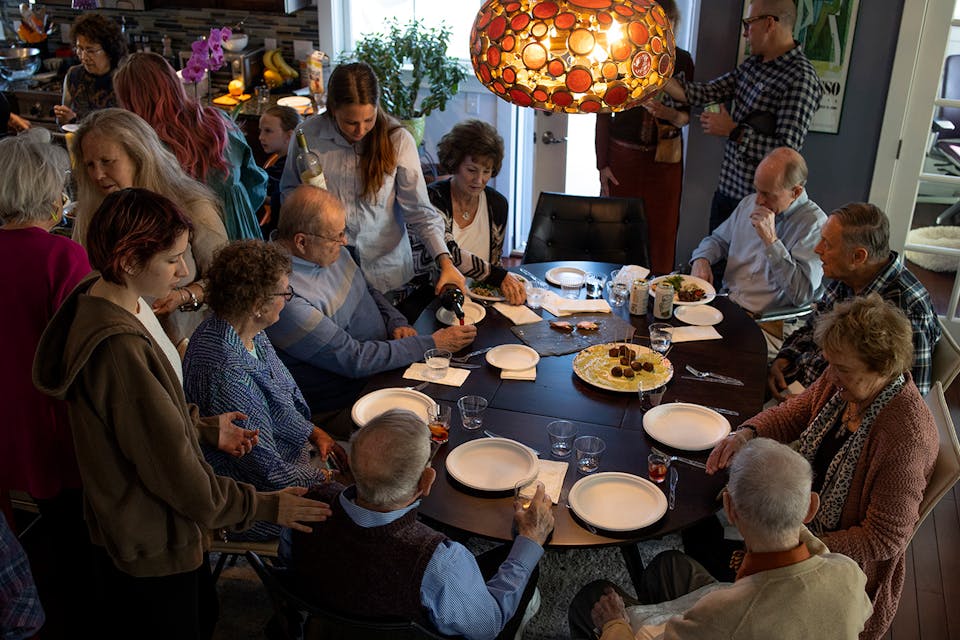 A Jewish World War II veteran celebrates his 104th birthday with friends and family, April 30, 2022 in Burlington, Vermont. *Andrew Lichtenstein/Corbis via Getty Images*. American Jews
