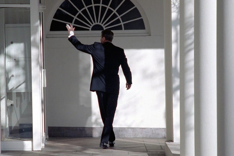 Ronald Reagan walking along the White House colonnade and waving goodbye on his last day in office, January 20, 1989. *Alamy/Wonderstock.* The Right Continetti Main MS
