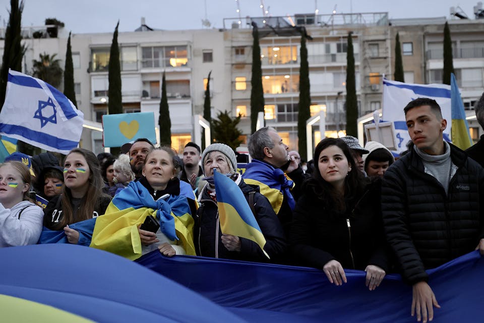 A pro-Ukrainian demonstrator in Tel Aviv on March 20, 2022. *JACK GUEZ/AFP via Getty Images.* Evelyn Ukraine