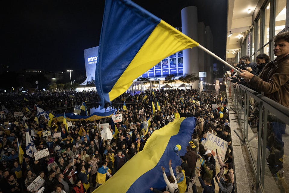 Israelis in Tel Aviv protesting Russia's invasion of Ukraine on February 26, 2022. *Mostafa Alkharouf/Anadolu Agency via Getty Images.* Koss Ukraine Main