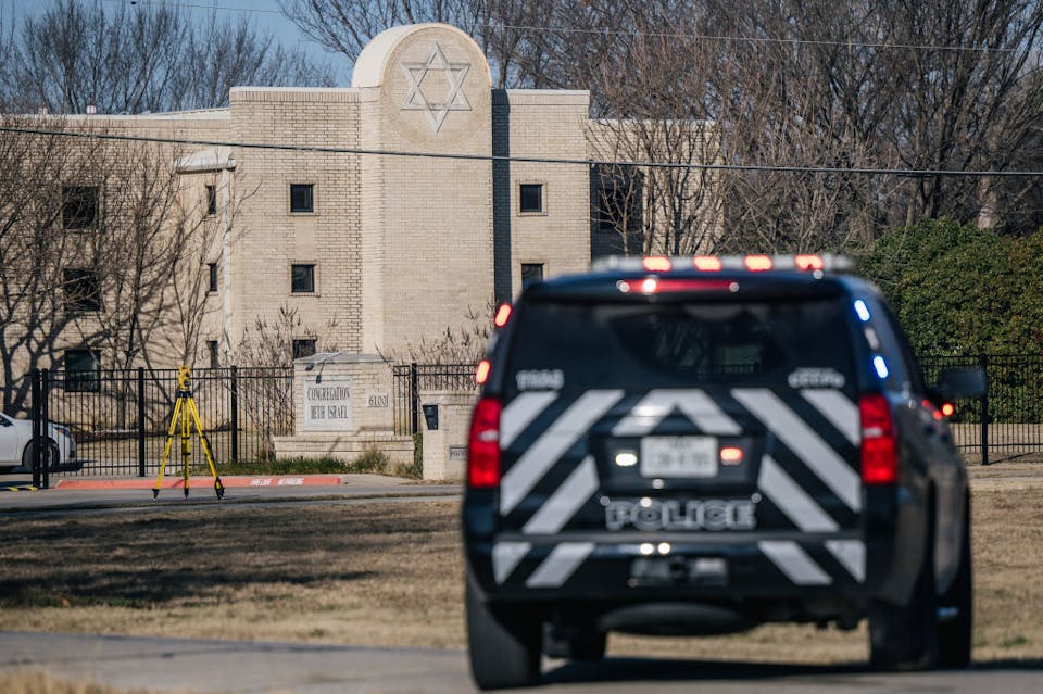 COLLEYVILLE, TEXAS – JANUARY 16: A law enforcement vehicle sits near the Congregation Beth Israel synagogue on January 16, 2022 in Colleyville, Texas. All four people who were held hostage at the Congregation Beth Israel synagogue have been safely released after more than 10 hours of being held captive by a gunman. Yesterday, police responded to a hostage situation after reports of a man with a gun was holding people captive.  (Photo by Brandon Bell/Getty Images)