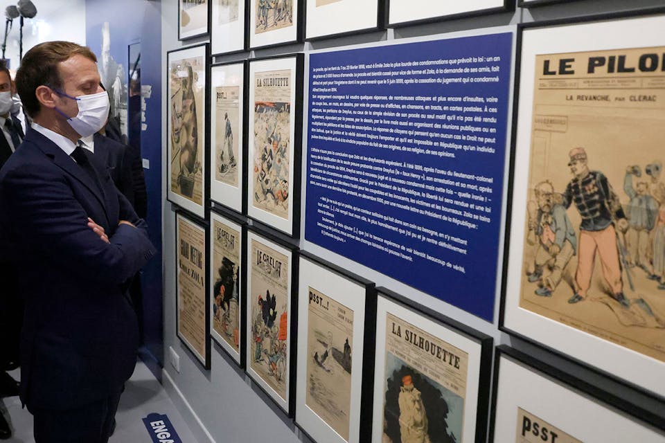 French President Emmanuel Macron visits the Dreyfus Museum near Paris on October 26, 2021. *LUDOVIC MARIN/POOL/AFP via Getty Images*. Macron Museum Main