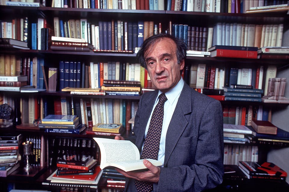 Nobel Prize winning author Eli Wiesel in his study at home, New York, New York, October 14, 1986. (Photo by Allan Tannenbaum/Getty Images)