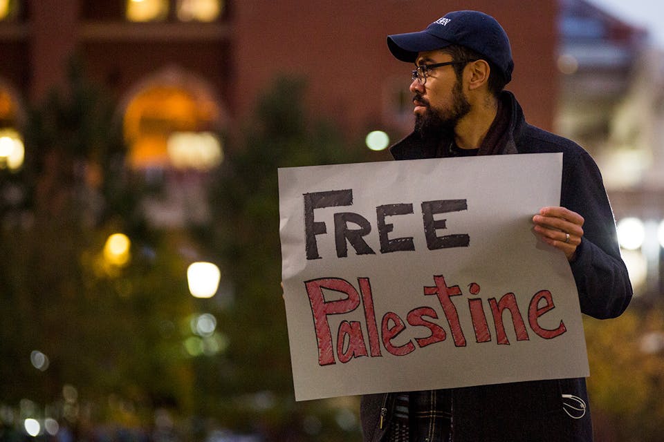 A protester at UNC-Chapel Hill on Nov. 13, 2017, in Chapel Hill, NC. *Casey Toth/The Herald-Sun via AP*. Rubenstein Main