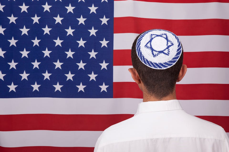 selimaksan/iStockPhoto. Jews America Flag