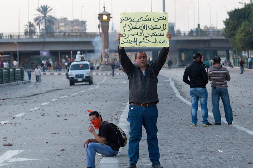 An anti-Muslim Brotherhood protester on April 19, 2013 at clashes near Tahrir Square in downtown Cairo between supporters of the regime of then-president Mohammad Morsi and those in opposition. *Getty.* Tahrir Main