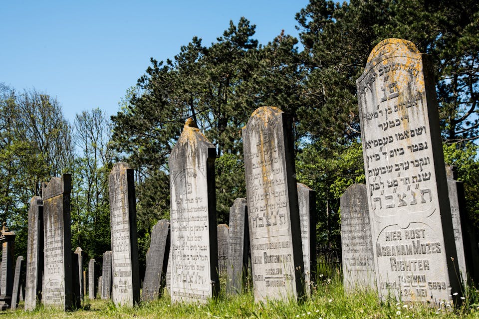 Graves in the Jewish cemetery in Den Helder, the Netherlands. *Bert de Boer/shutterstock*. headstone