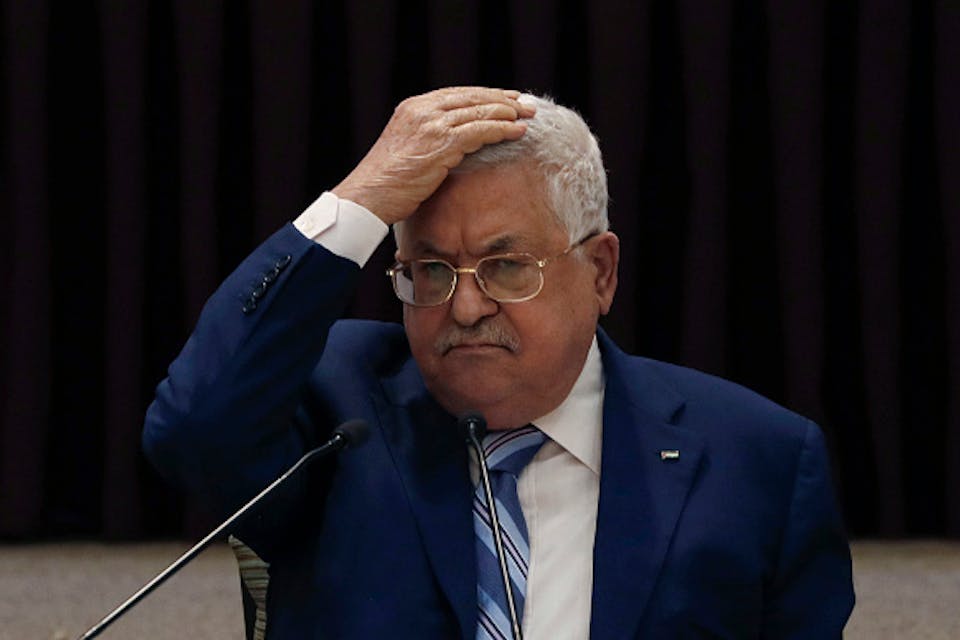 In Ramallah, Mahmoud Abbas puts his hand on his head during a leadership meeting of the Palestinian Authority about the Abraham Accords on August 18, 2020. *Photo by Mohamad Torokman/POOL/AFP via Getty Images. * President Mahmoud Abbas gestures during a meeting of the Palestinian leadership to discuss the United Arab Emirates’ deal with Israel to normalise relations, in Ramallah in the Israeli-occupied West Bank, on August 18, 2020. (Photo by MOHAMAD TOROKMAN / POOL / AFP) (Photo by MOHAMAD TOROKMAN/POOL/AFP via Getty Images)