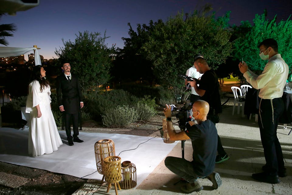 A wedding in Modi'in, Israel during the coronavirus pandemic on August 20, 2020.* Xinhua/Gil Cohen Magen via Getty Images.* Berens Israel 2 Main