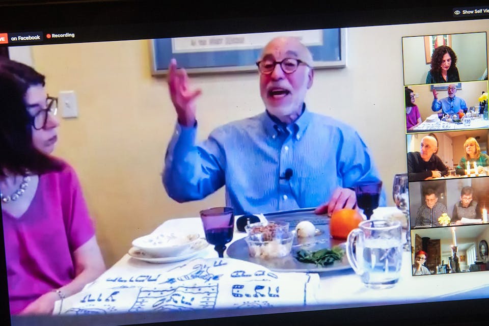 *A rabbi hosts a virtual community seder on Zoom during the first night of Passover on April 8, 2020.* SAUL LOEB/AFP via Getty Images. Zoom Main