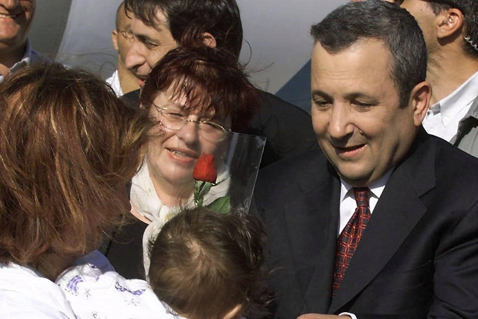 Israeli Prime Minister Ehud Barak greets immigrants arriving by plane from Moscow on May 7, 2000 in Tel Aviv. *SVEN NACKSTRAND/AFP via Getty Images.* Barak Russians Main