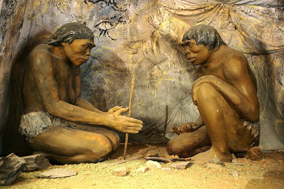 A diorama showing ancient cavemen inside the National Museum of Mongolian History in Ulaanbaatar, Mongolia. *Wikimedia.* 1280px-Diorama,_cavemen_-_National_Museum_of_Mongolian_History
