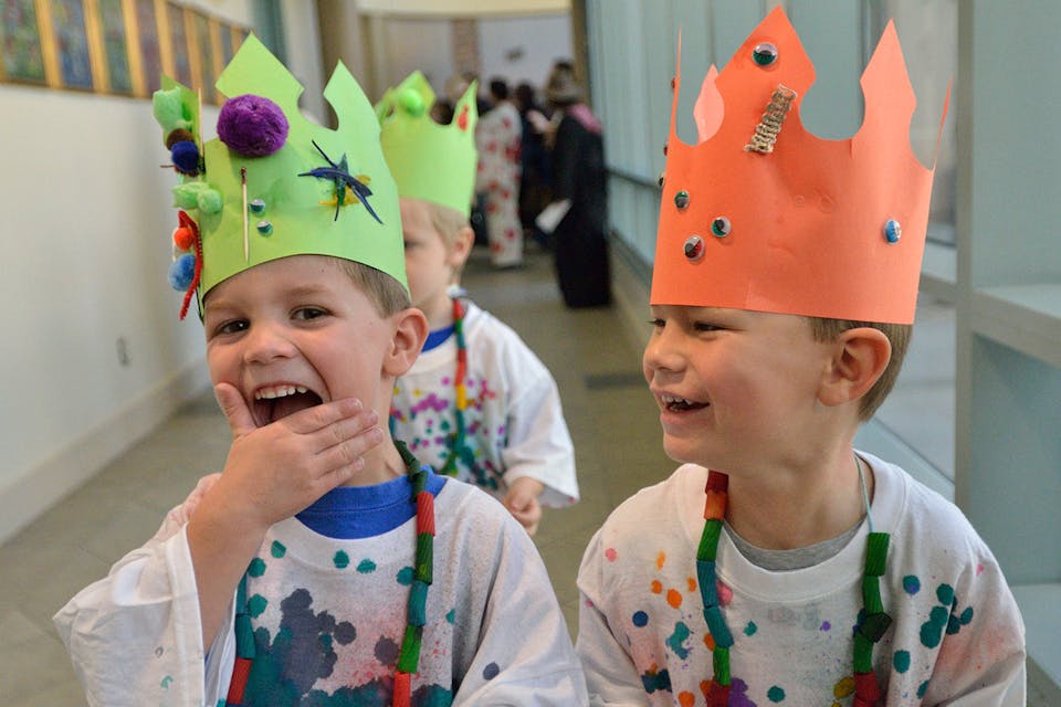 Two boys share a laugh at the end of a Purim parade at the Alpert Jewish Community Center in Long Beach, Calif., on March 9, 2012. *Jeff Gritchen/Digital First Media/Orange County Register via Getty Images*. Phil Hag