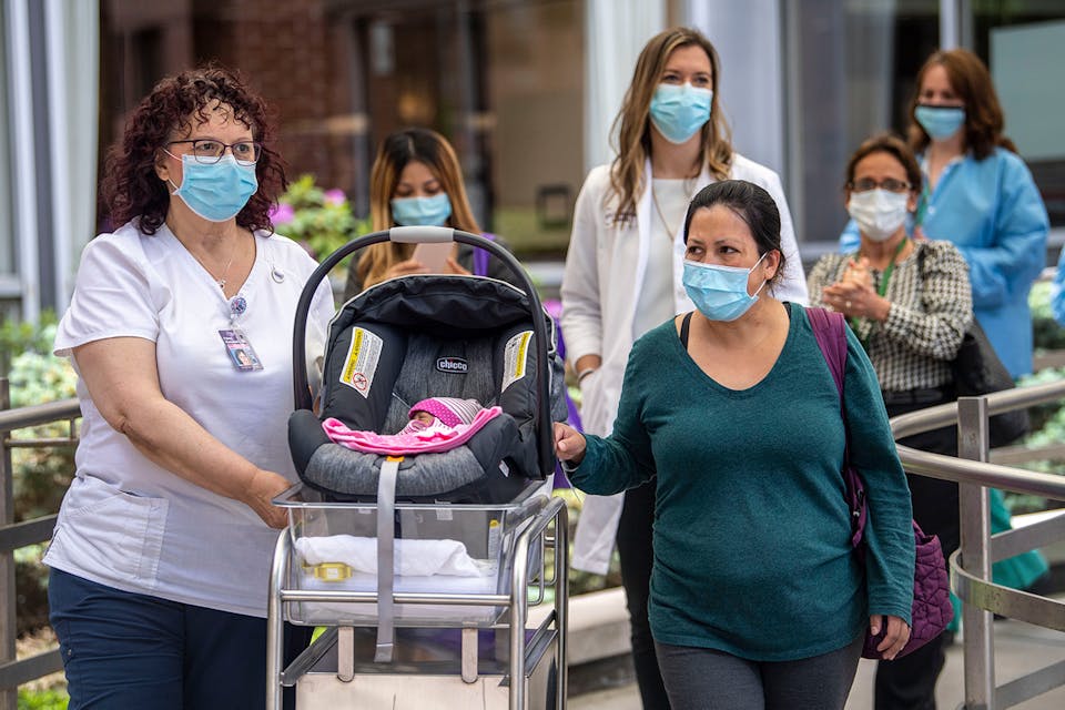 Adriana Torres with her baby daughter Leah, who is being released from NYU Winthrop Hospital in Mineola, New York on May 27, 2020. Leah was born prematurely while Adriana was in a medically-induced coma due to COVID-19. *Alejandra Villa Loarca/Newsday RM via Getty Images.* Last Baby Main