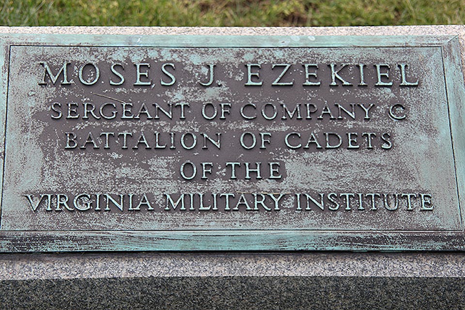 The tombstone of Moses Ezekiel. *Wikipedia.* Confederate_Monument_-_Moses_Ezekiel_grave_-_Arlington_National_Cemetery_-_2011