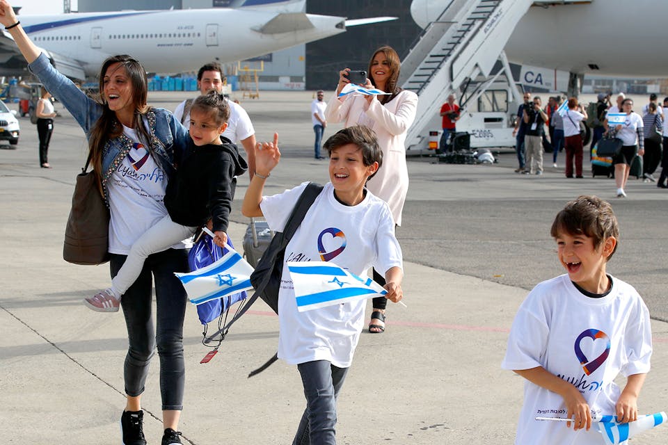 *Jewish immigrants from France arriving at Ben Gurion International Airport in Israel on July 17, 2019*. JACK GUEZ/AFP via Getty Images. Aliyah Rindner Main