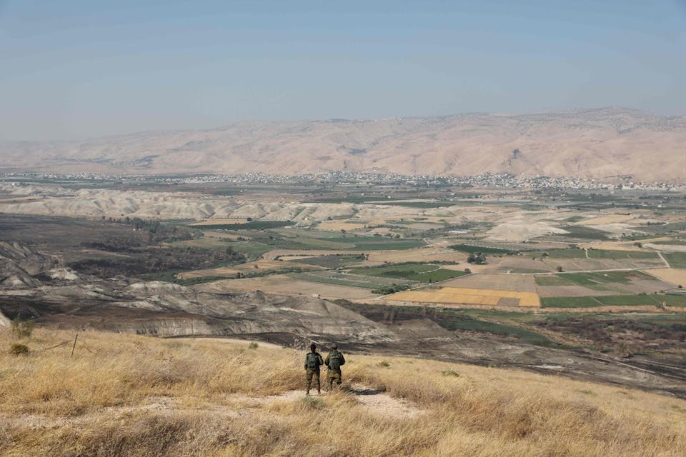 *Israeli soldiers overlooking the Jordan Valley in June 2019.* Abir Sultan/Agence France-Presse/Getty Images VYTHO7WT5EI6TCJEDW35VR4X7M