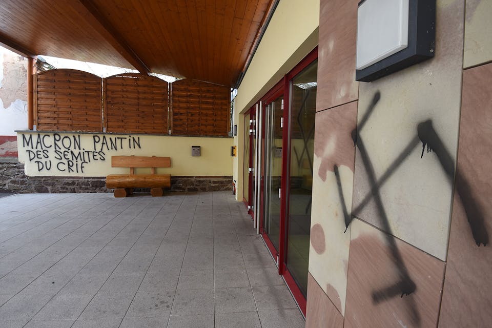 *Anti-Semitic graffiti on the wall of the city hall in Heiligenberg in eastern France.* PATRICK HERTZOG/AFP/Getty Images. France Swastika