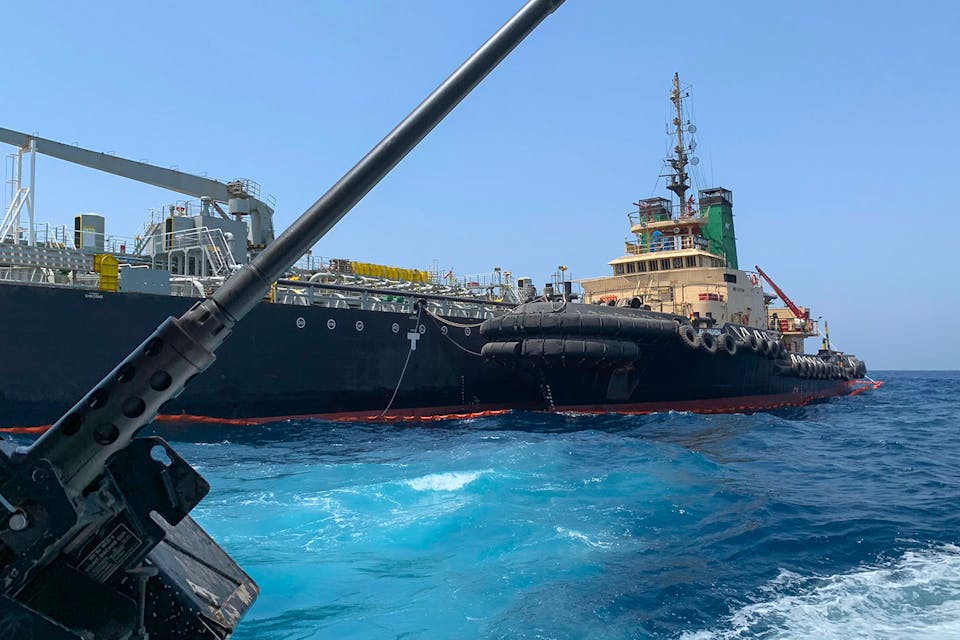 *The Japanese oil tanker *Kokuka Courageous* off the port of the Gulf emirate of Fujairah on June 19, 2019 after being attacked by Iran.* MUMEN KHATIB/AFP/Getty Images. Iran Tanker Main