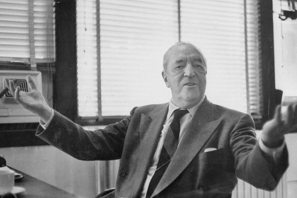 *Mies Van Der Rohe at his desk.* Frank Scherschel/The LIFE Picture Collection/Getty Images. Mies Main