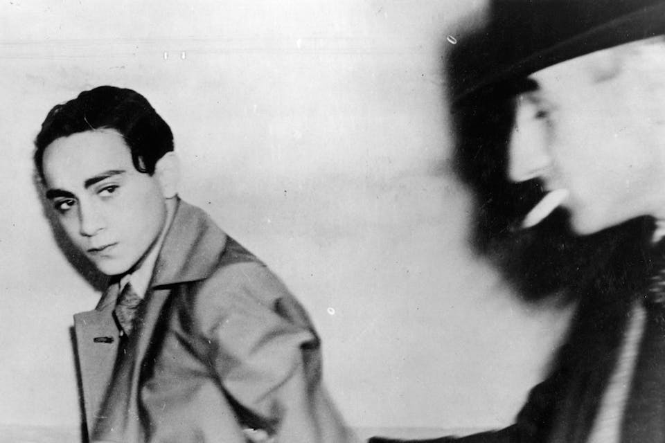 *Herschel Grynszpan under arrest for the assassination of the German diplomat Ernst vom Rath, Paris, November 7, 1938. *Sueddeutsche Zeitung Photo/Getty. Herschel G