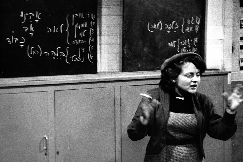 Teaching Hebrew in 1955. (Photo by © Hulton-Deutsch Collection/CORBIS/Corbis via Getty Images). Hebrew Teacher Main