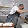 *Russell, the proprietor of Russell's Bakery in Jerusalem, at work. *Flash90/Sophie Gordon. Russell Bakery m