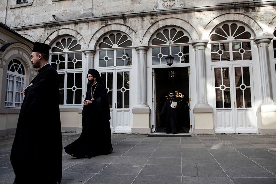*Orthodox officials walk outside the Fener Greek Patriarchate in Istanbul, Turkey on November 03, 2018.* Getty. Tadros Main