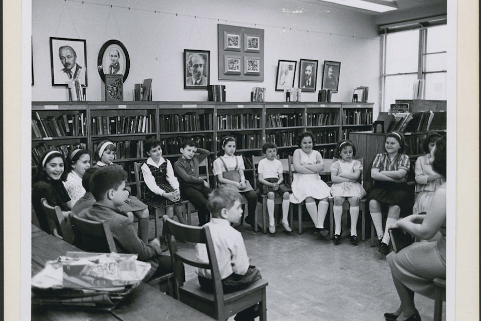 *The drama director of Montreal's Jewish Public Library leads a Saturday morning story-telling session.* Library and Archives of Canada. e011055633-v8